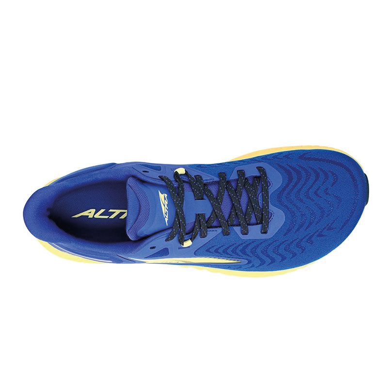 Modelo Altra Torin 7, zapatilla de running para hombre con diseño anatómico, amortiguación ligera y suela flexible.